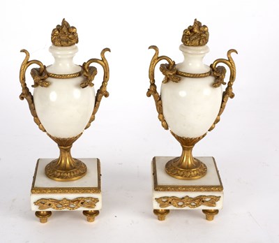 Lot 433 - A pair of white marble garniture urns with...