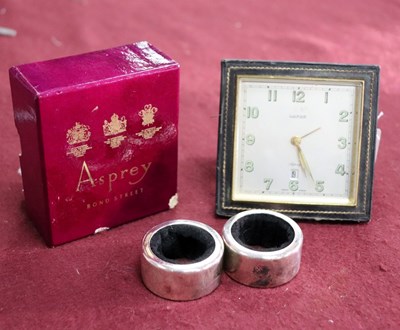 Lot 462 - A Luxor Asprey alarm clock, the square dial...