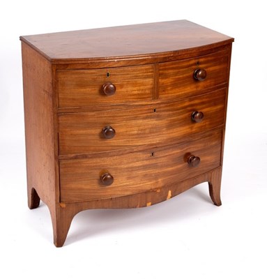 Lot 524 - An early 19th Century mahogany bowfront chest...