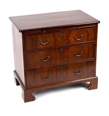 Lot 528 - A mahogany chest of three drawers with...