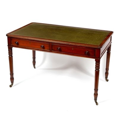 Lot 533 - A mahogany writing table, the rectangular top...