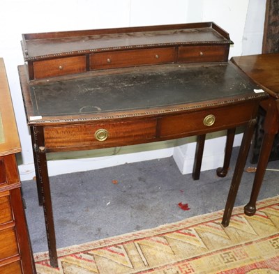 Lot 535 - An Edwardian mahogany writing table with three...