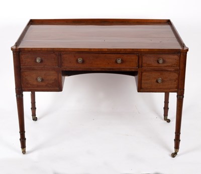 Lot 552 - A George IV mahogany kneehole washstand with...