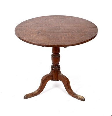 Lot 561 - An early 19th Century circular table on a...