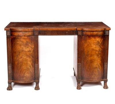 Lot 566 - A Regency mahogany sideboard with reeded...