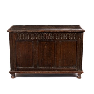 Lot 606 - An 18th Century oak chest with carved frieze...