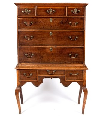 Lot 608 - An 18th Century mahogany chest of three long...