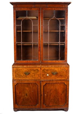 Lot 617 - An early 19th Century mahogany bookcase,...