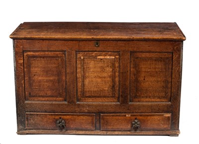 Lot 621 - An oak chest with panelled front, fitted two...