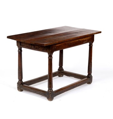 Lot 622 - A 17th Century oak table, on turned legs and...