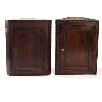 Lot 628 - Two oak corner cupboards