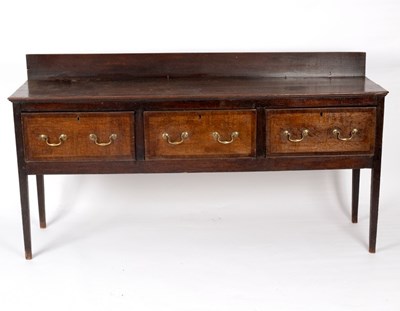 Lot 635 - An 18th Century oak dresser fitted three...