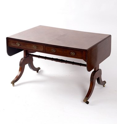 Lot 646 - A Regency mahogany sofa table, two drawers to...