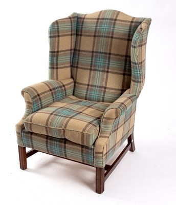 Lot 647 - A George III style wing armchair