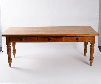 Lot 651 - A pine farmhouse table, fitted three drawers...