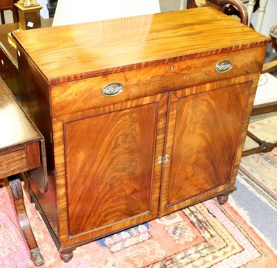 Lot 655 - A George IV mahogany side cabinet, fitted a...