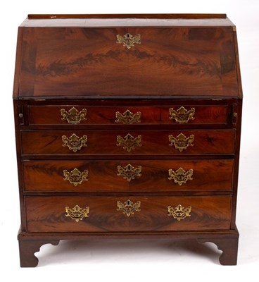 Lot 682 - A George III mahogany bureau, circa 1760, the...