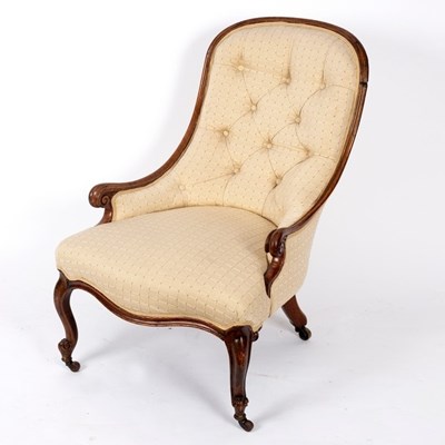 Lot 687 - A Victorian scoop back nursing chair, on...