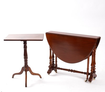 Lot 703 - A Victorian walnut Sutherland table with oval...