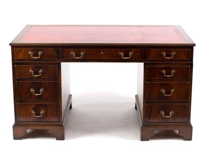 Lot 705 - A George III style pedestal desk, 137cm wide