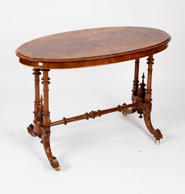 Lot 711 - A Victorian burr walnut centre table, the oval...