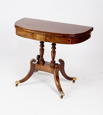 Lot 712 - A Regency mahogany and brass inlaid tea table,...