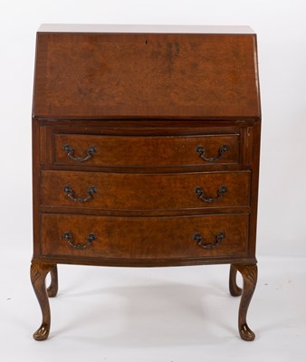 Lot 714 - A Queen Anne style walnut bureau on cabriole...