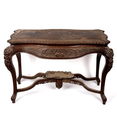 Lot 721 - A Chinese carved hardwood centre table, early...