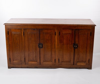 Lot 728 - A French oak cupboard enclosed by doors,...