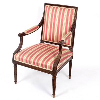 Lot 734 - An upholstered open armchair, the reeded arm...