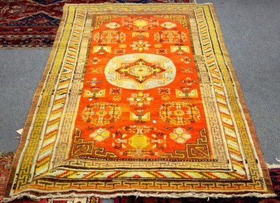 Lot 762 - An Eastern rug with a central medallion on an...