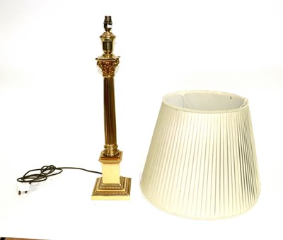 Lot 782 - A brass Corinthian column lamp and shade,...