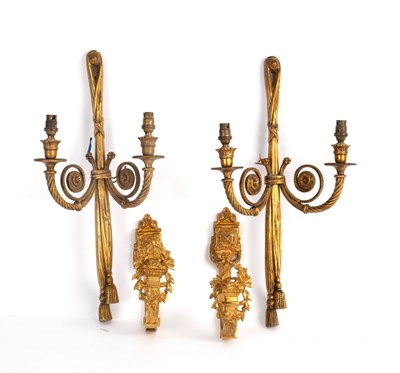 Lot 791 - A pair of gilt metal curtain tie backs,...