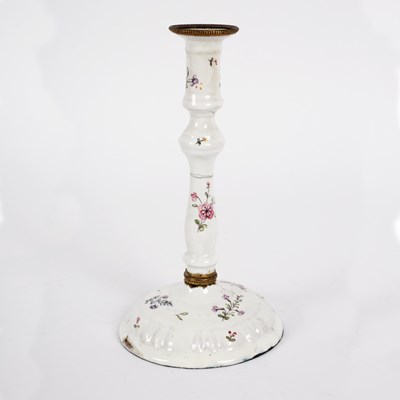Lot 12 - A South Staffordshire white enamel candlestick,...