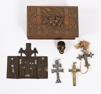 Lot 32 - A small gilt bronze model of a skull, with...