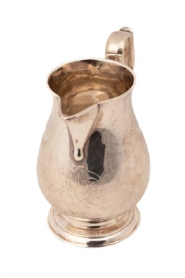 Lot 158 - A George II silver sparrow beak jug