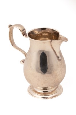 Lot 158 - A George II silver sparrow beak jug