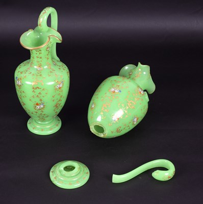 Lot 421 - A pair of green opaline glass ewers, French or...