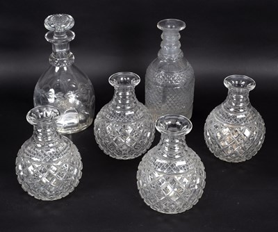 Lot 422 - A 19th Century cut glass decanter, the base...