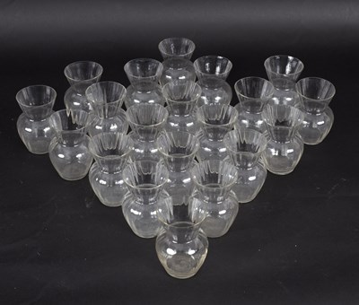 Lot 426 - Twenty small glass posy vases with fluted...