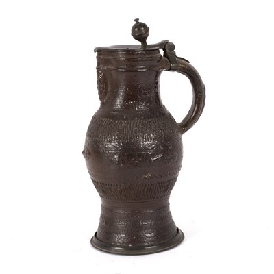 Lot 451 - A pewter mounted German stoneware jug, perhaps...