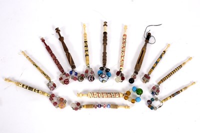 Lot 525 - Nine bone lace bobbins, one dated 1868 and...