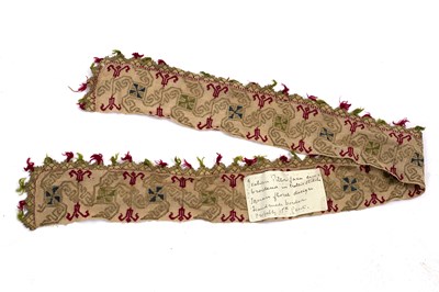 Lot 539 - A section of embroidered edging, bears label...