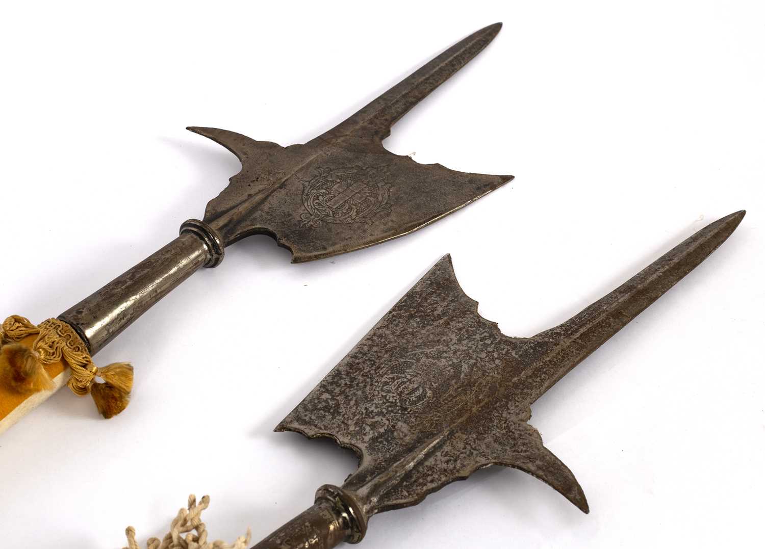 Halberd Examples Lot 565 - A pair of 19th Century ceremonial halberds,