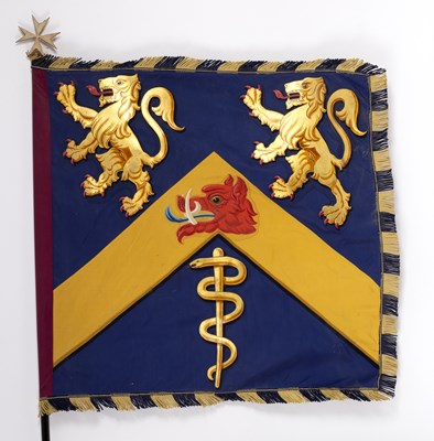 Lot 566 - A flag bearing an armorial, with fringed edges,...