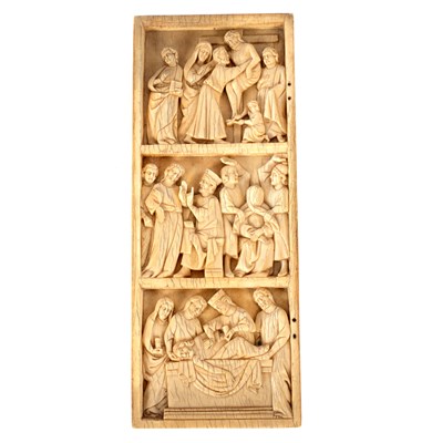 Lot 605 - An ivory relief in Gothic style, in three...