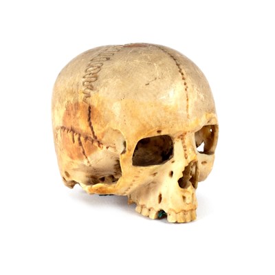 Lot 612 - An ivory skull, probably English or German,...