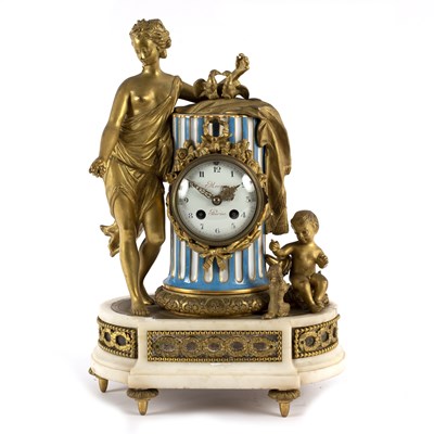 Lot 638 - A French gilt metal mounted mantel clock, the...