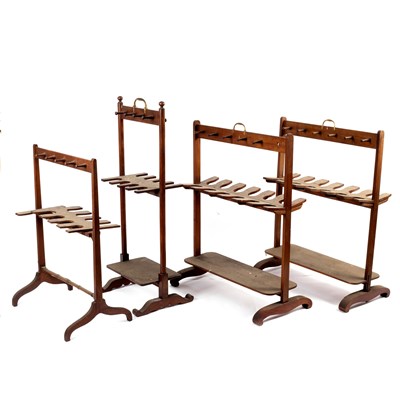 Lot 643 - A pair of mahogany boot racks, with brass...