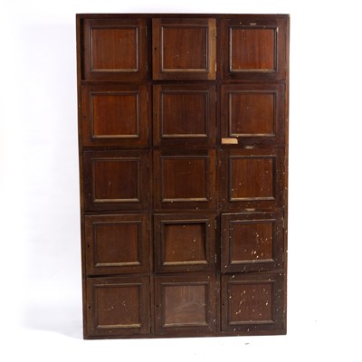 Lot 665 - An Edwardian mahogany bank of lockers, fifteen...